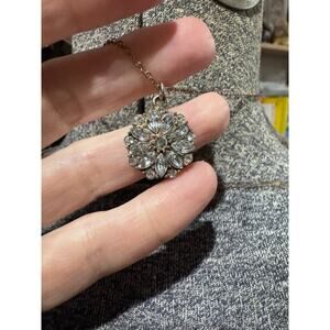 Sparkling snowflake gold tone necklace